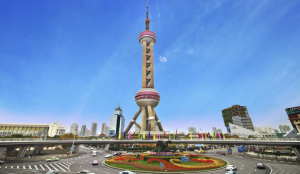 A futuristic TV tower with observation decks offering panoramic views of the Shanghai skyline.