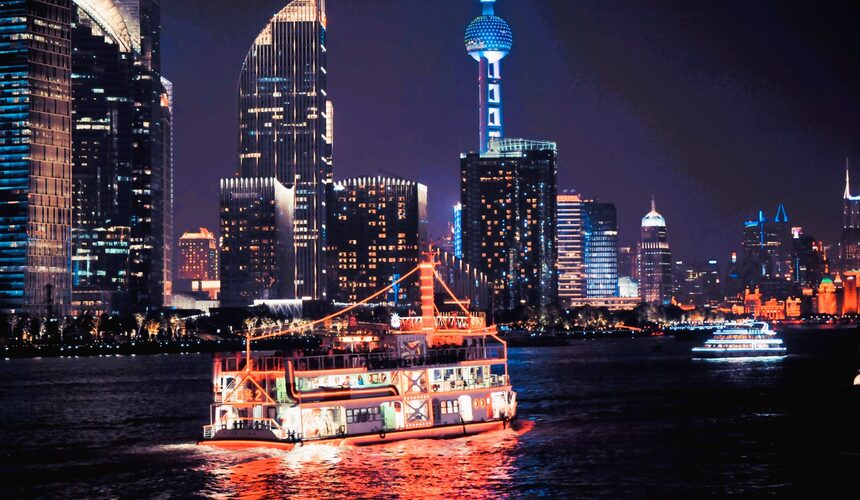 A scenic boat ride offering illuminated views of Shanghai’s skyline, from historic architecture on the Bund to the glowing skyscrapers of Pudong.