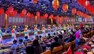 Delicately plated dish of traditional Beijing imperial cuisine served in ornate tableware.