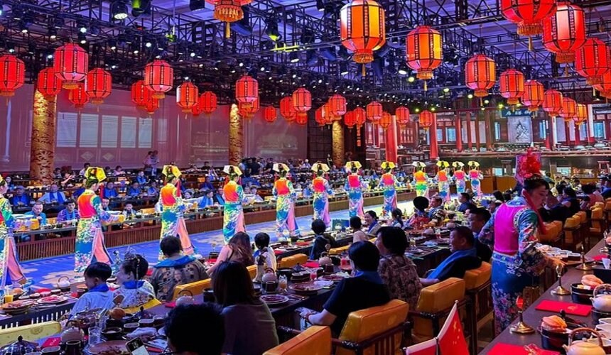 Delicately plated dish of traditional Beijing imperial cuisine served in ornate tableware.