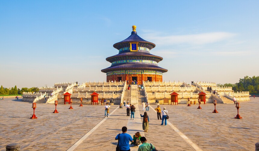 The iconic Hall of Prayer for Good Harvests at the Temple of Heaven in Beijing, under a blue sky.