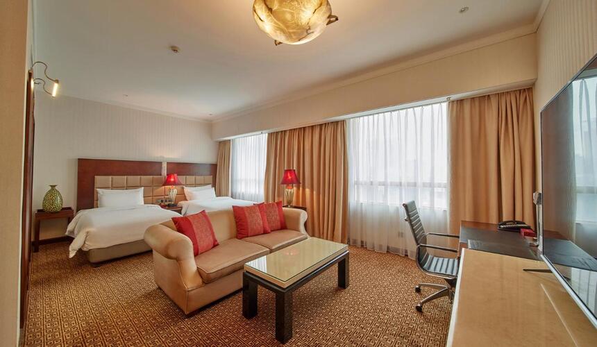 Classic Chinese-style architecture and lush surroundings at Dong Fang Hotel in Guangzhou