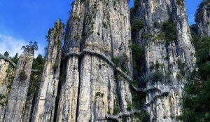 Adventurer rappelling down a waterfall in Enshi Grand Canyon, Hubei, China