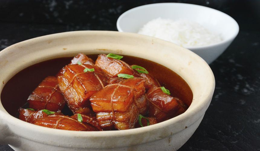 Rich and glossy hong shao rou (Shanghai-style braised pork belly) served with rice.
