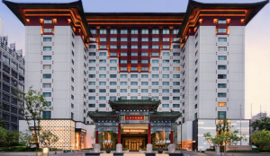 Luxurious lobby of The Peninsula Beijing featuring marble decor and elegant design.