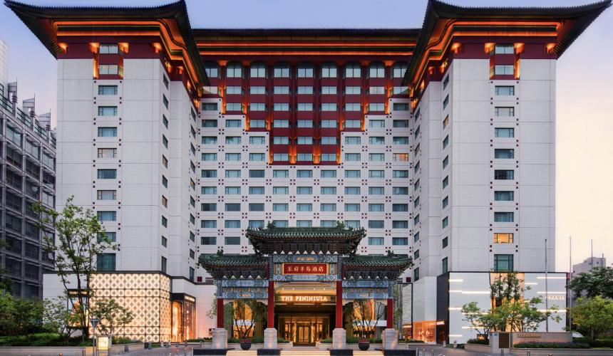Luxurious lobby of The Peninsula Beijing featuring marble decor and elegant design.