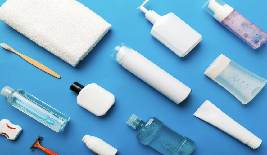 Travel-sized toiletries, medications, and hand sanitizer organized in a clear pouch