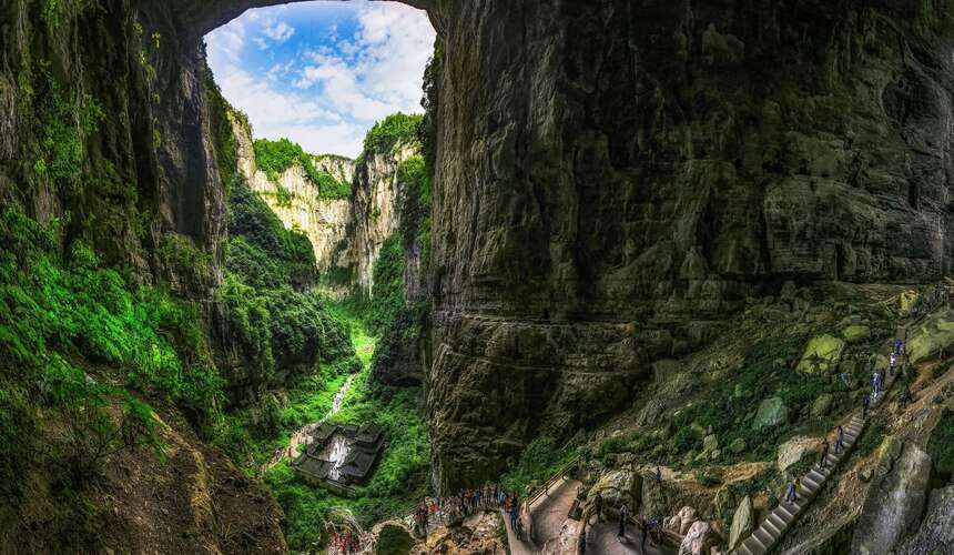 Majestic natural stone arches and deep gorges at Wulong Karst Geological Park in Chongqing.