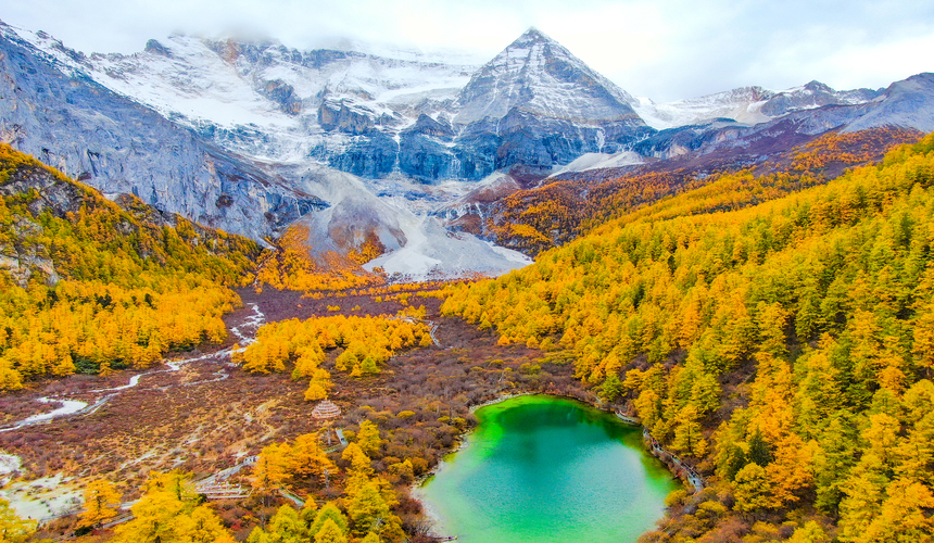Snow-capped sacred peaks and crystal-clear lakes in Yading Nature Reserve, Sichuan Province