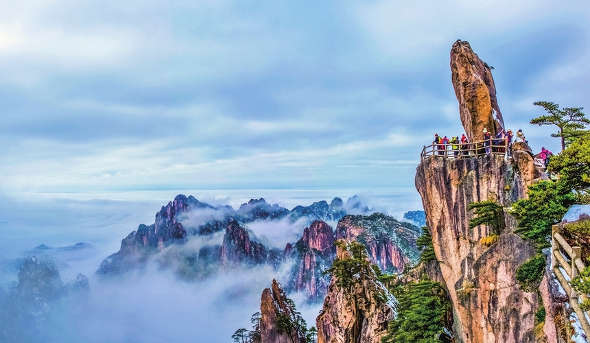 Dramatic granite peaks and sea of clouds over Yellow Mountain (Huangshan) in Anhui Province