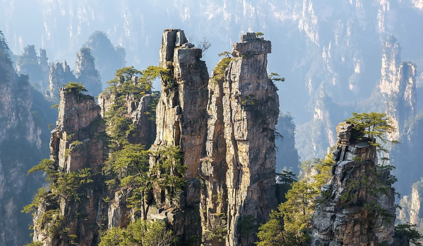 Towering sandstone peaks shrouded in mist in Zhangjiajie National Forest Park, Hunan