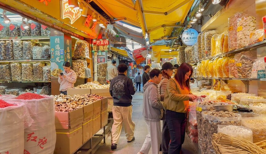 Traditional Chinese herb and spice stalls at Qingping Market in Guangzhou