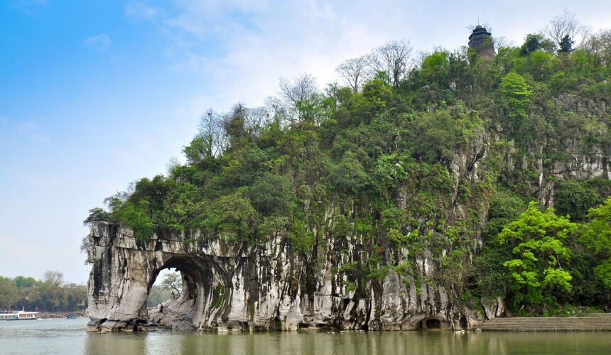 Famous Elephant Trunk Hill arch rock formation by the river in Guilin.