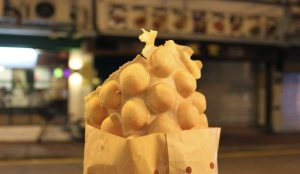 Hong Kong egg waffles served hot and crispy with sweet toppings.