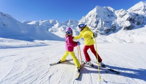 Tourists skiing on snowy slopes at a ski resort in China