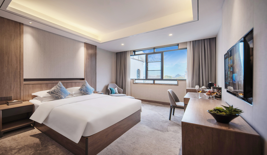 Elegant Zhangjiajie Sunshine Hotel entrance with landscaped gardens