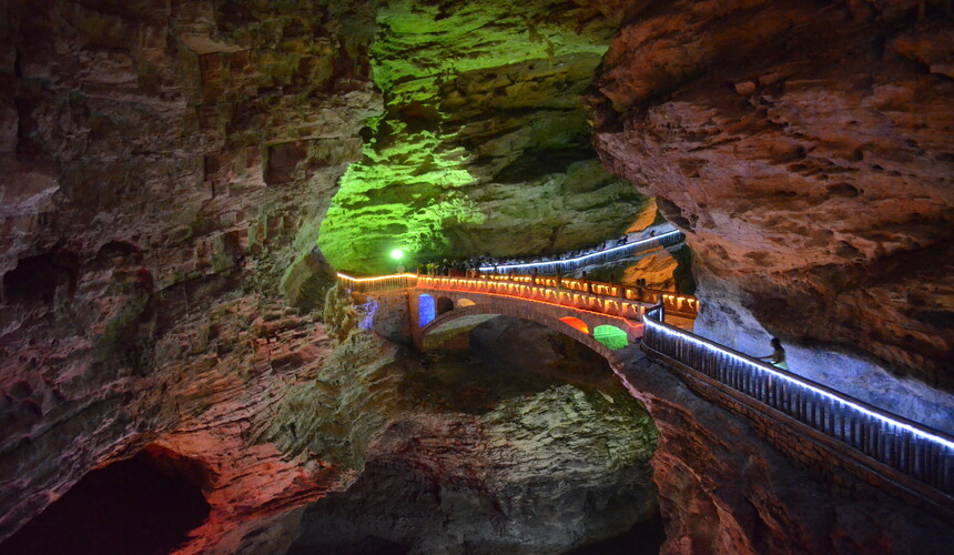 Colorful stalactites and stalagmites inside Yellow Dragon Cave in Zhangjiajie