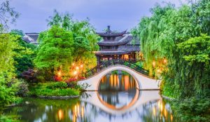 Hangzhou travel guide showcasing West Lake, tea plantations, and scenic landscapes.