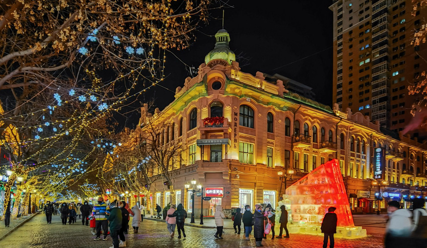Harbin Central Street lined with historic buildings, shops, and local eateries.