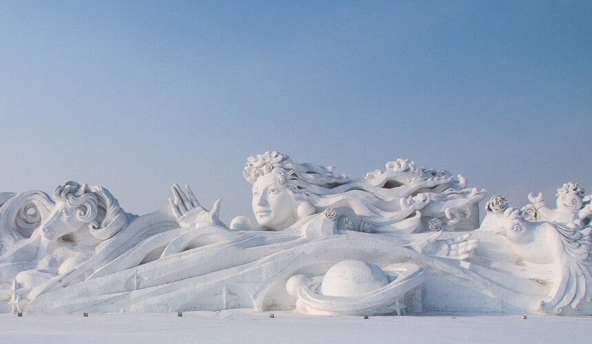 Sun Island Snow Sculpture Art Expo in Harbin with intricate snow artworks.