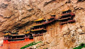 Ancient temple built into a cliff face near Datong, blending Buddhist, Taoist, and Confucian elements.