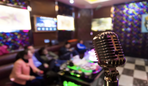 Private karaoke rooms in China where friends sing together late at night.