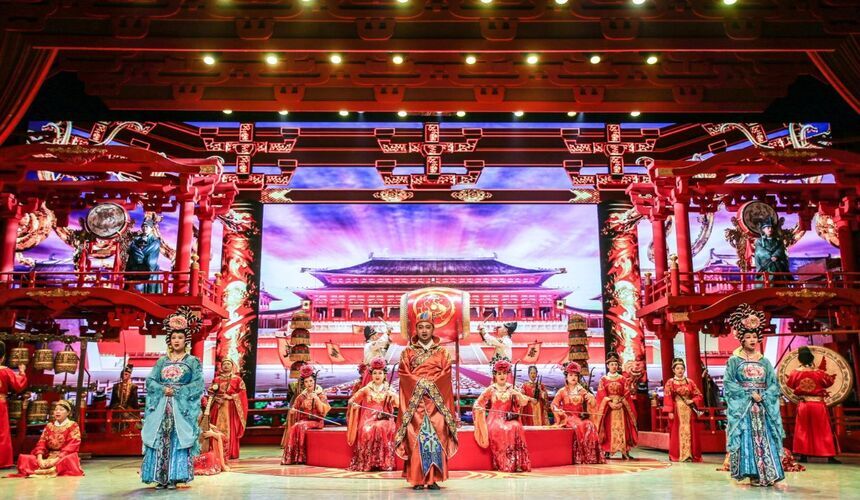 Tang Dynasty music and dance show in Xi’an with performers in historical costumes recreating ancient court entertainment.