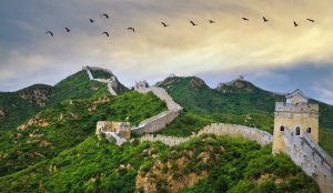 The Great Wall and city skyline in Beijing, China travel destination