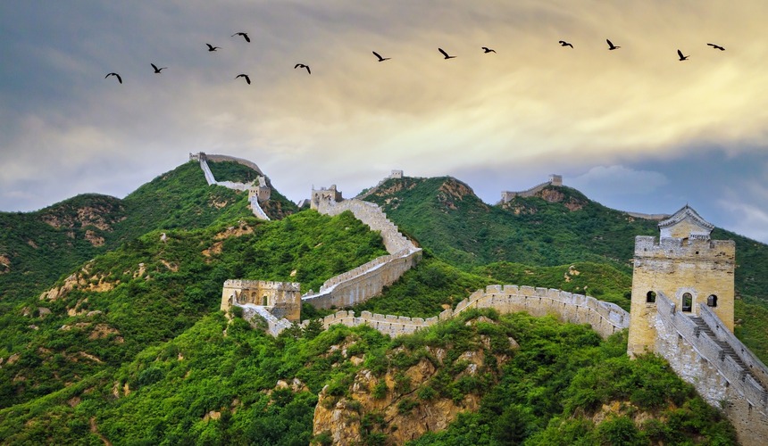 The Great Wall and city skyline in Beijing, China travel destination