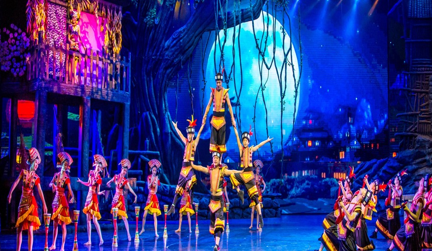 Performers in vibrant ethnic costumes at the Xiangxi cultural show in Zhangjiajie