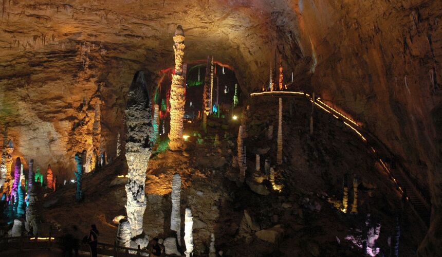 Colorful illuminated stalactites inside Yellow Dragon Cave in Zhangjiajie National Forest Park