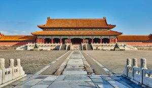 Traditional Chinese garden inside Beijing’s Forbidden City featuring ornate pavilions, rockeries, and ancient cypress trees.