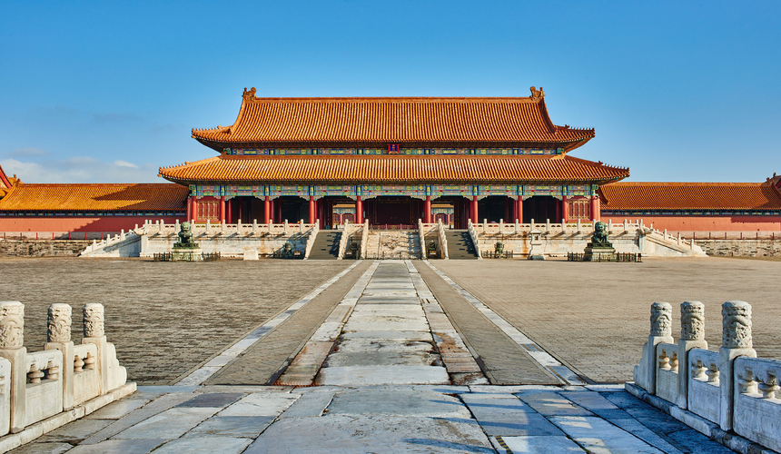 Traditional Chinese garden inside Beijing’s Forbidden City featuring ornate pavilions, rockeries, and ancient cypress trees.