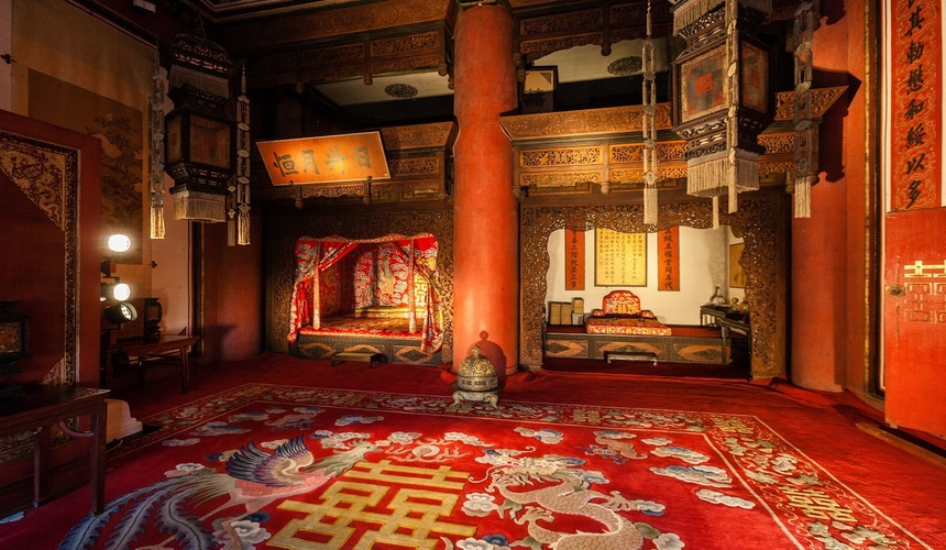 The Palace of Earthly Tranquility with traditional red-and-gold interiors, ornate doors, and historical royal living quarters.