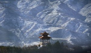 Peaceful landscape of Northern Mount Heng featuring ancient temples and forested mountain scenery.