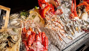 Fresh seafood dishes served at a local restaurant in Sanya, China