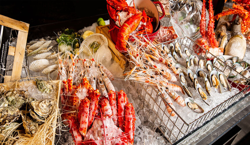 Fresh seafood dishes served at a local restaurant in Sanya, China