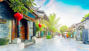 Historic streets of Kuanzhai Alley lined with traditional Sichuan architecture, cafés, and local shops.