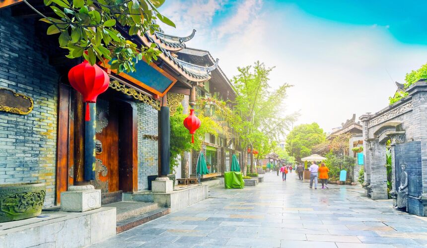 Historic streets of Kuanzhai Alley lined with traditional Sichuan architecture, cafés, and local shops.