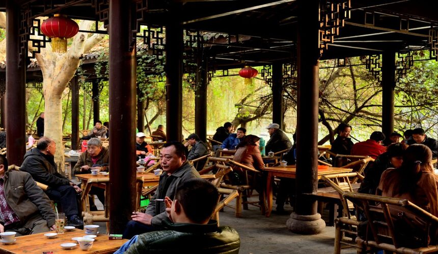 Visitors enjoying tea at a traditional teahouse in People's Park, Chengdu's favorite local gathering place.