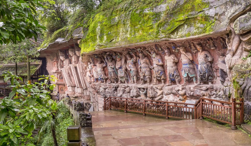Intricately carved Buddhist statues and ancient stone sculptures at the UNESCO-listed Dazu Rock Carvings.